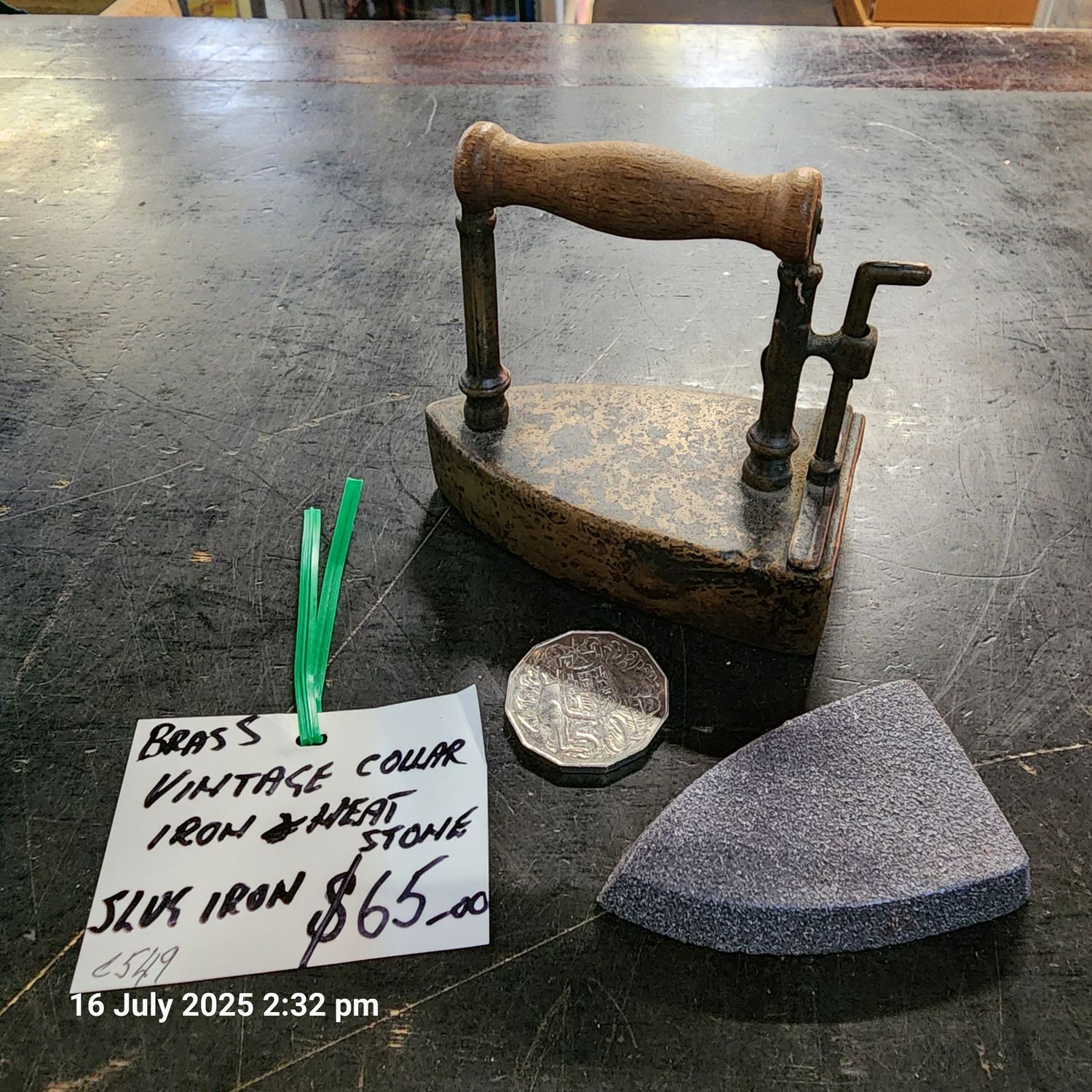Brass slug iron with stone