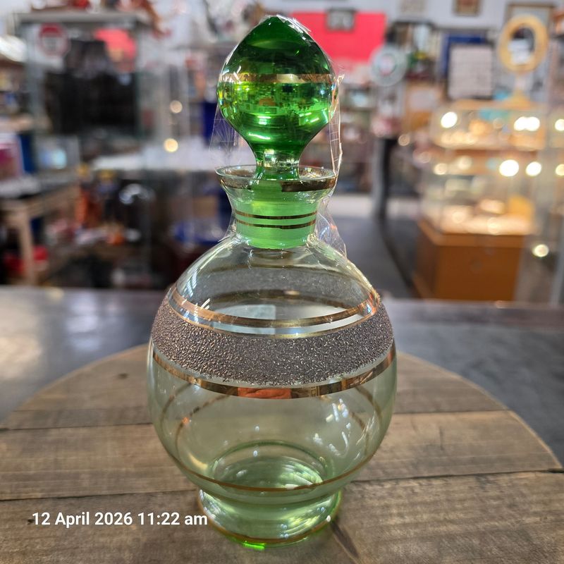 Vintage green glass gold etched decanter