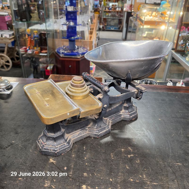 Antique shop scales with brass weights
