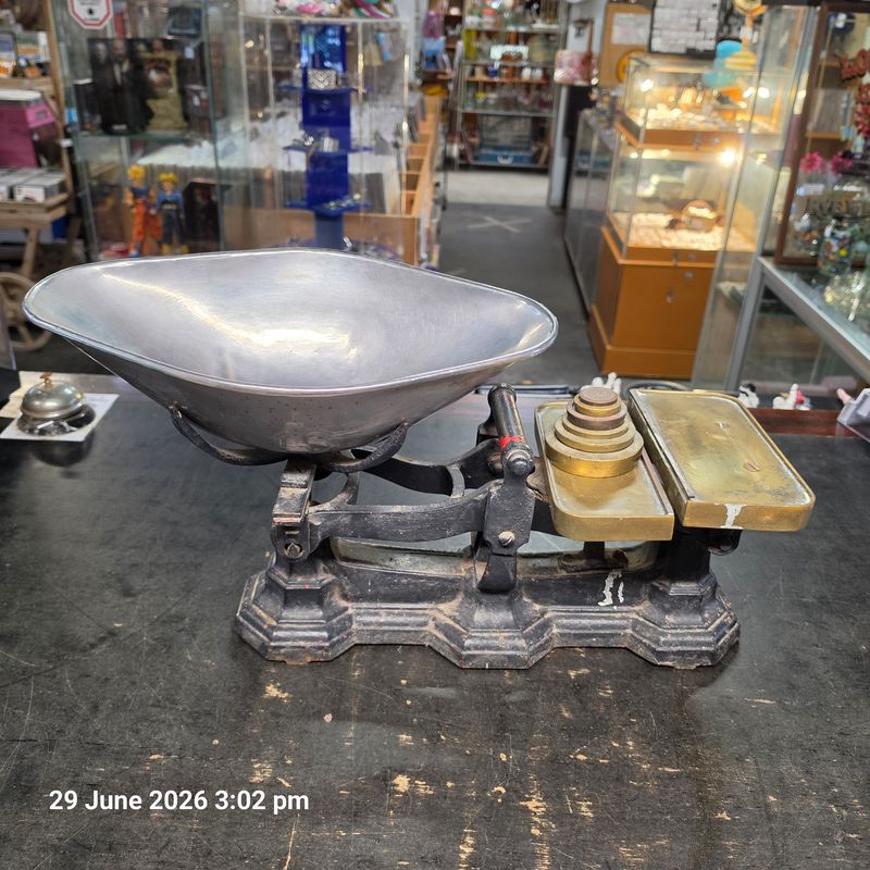 Antique shop scales with brass weights