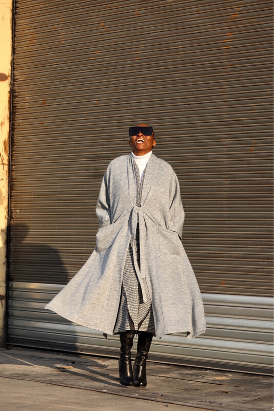 Poncho With Front Pockets And Tie End