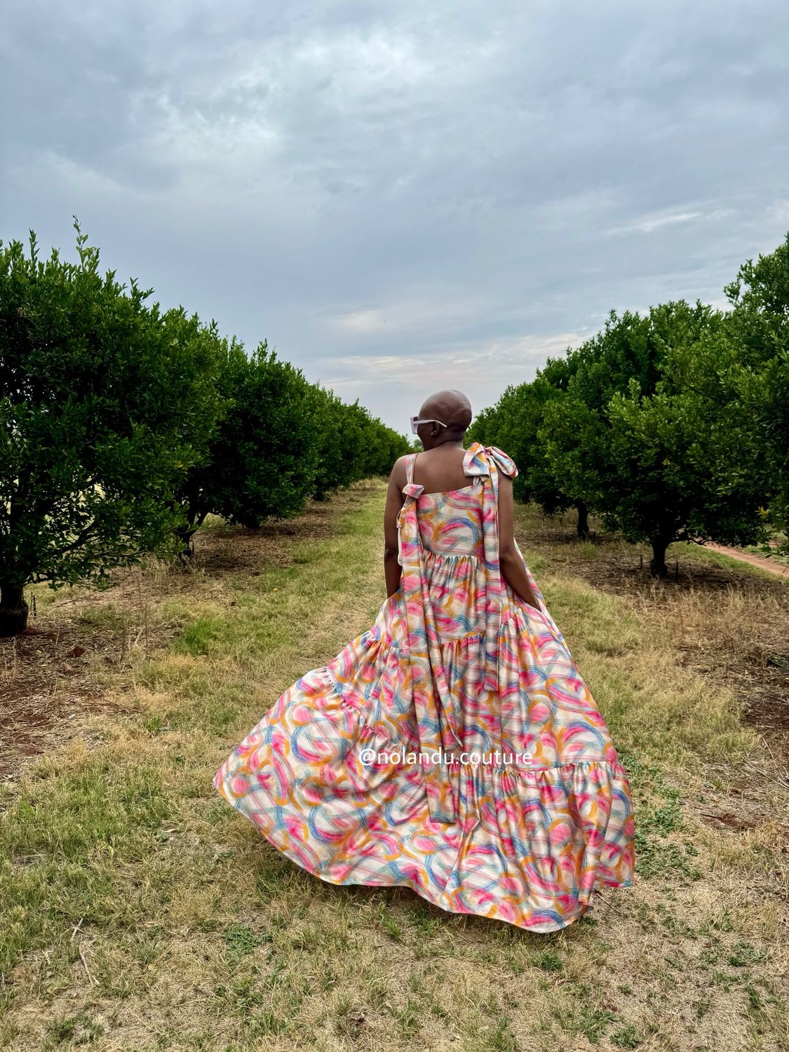 Asymmetric Tiered Sun Dress With Long Tie Straps And Pockets