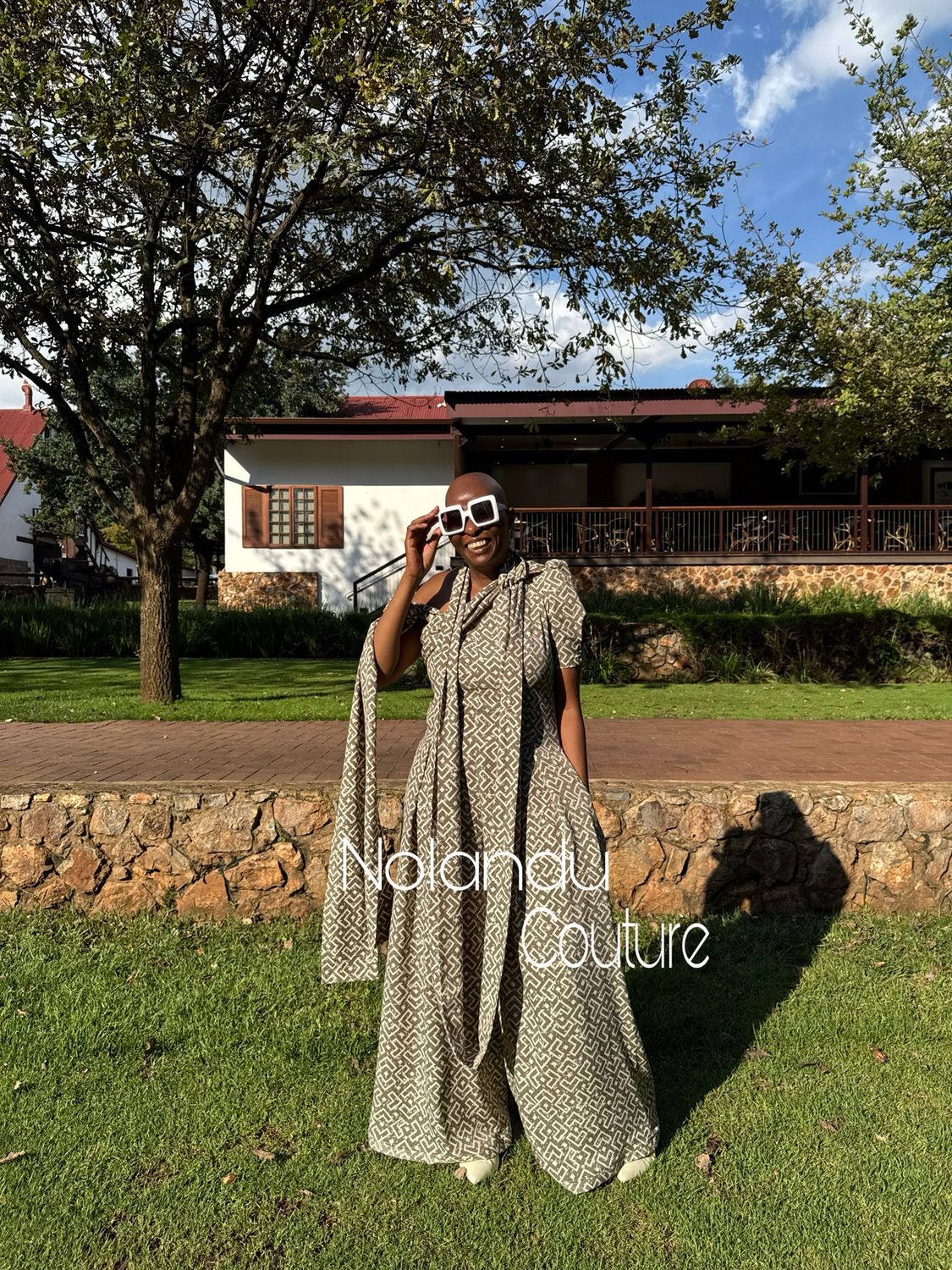Jumpsuit With One Sleeve, Shoulder Drape And Side Zip