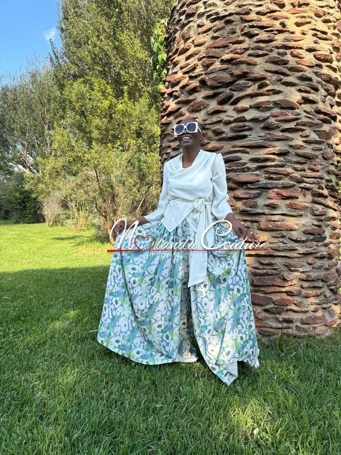 High Waist Pleated Palazzo Pants With Pockets And Attached Belt. Draped Top With Side Belt And Back Zip