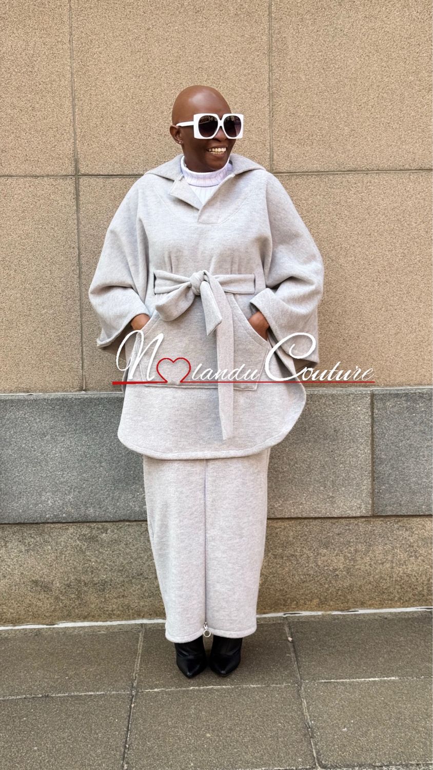 Straight Cut Pull On Skirt With Front Zip And Elastic Waist. Cape With Hoodie, Belt And Front Pockets