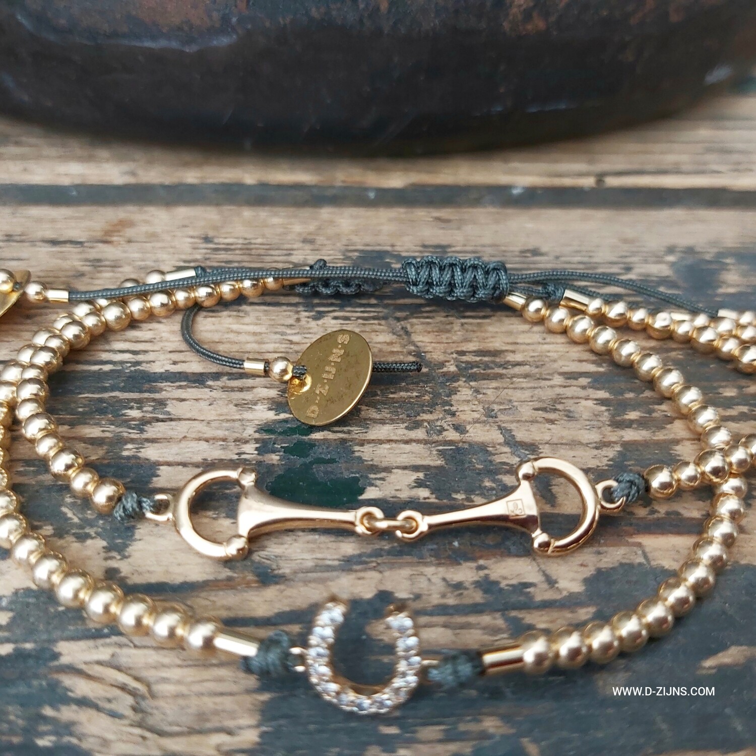 D-ZIJNS HOEFIJZER STRASS 14K GOUDEN BAL