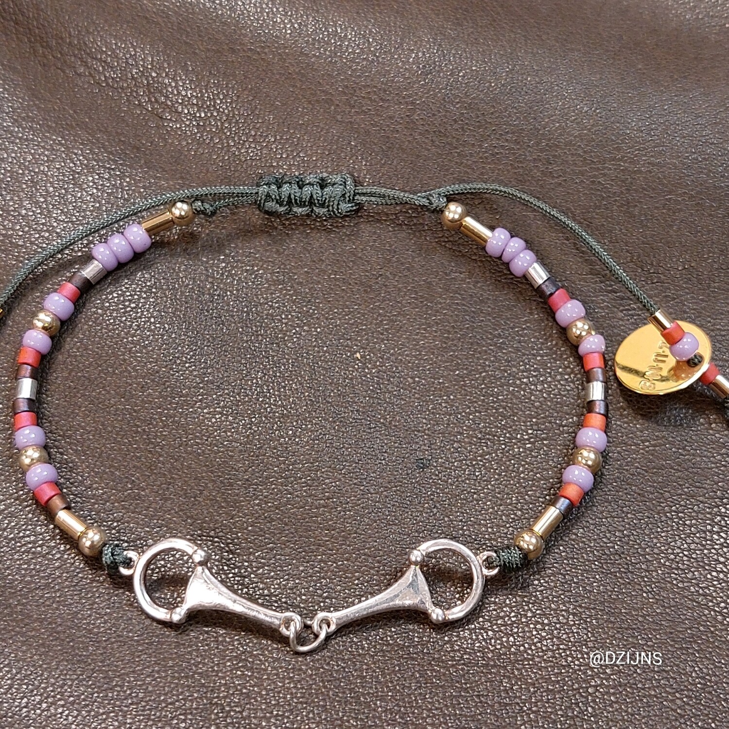 D-ZIJNS ARMBAND BIT ZILVER PAARS