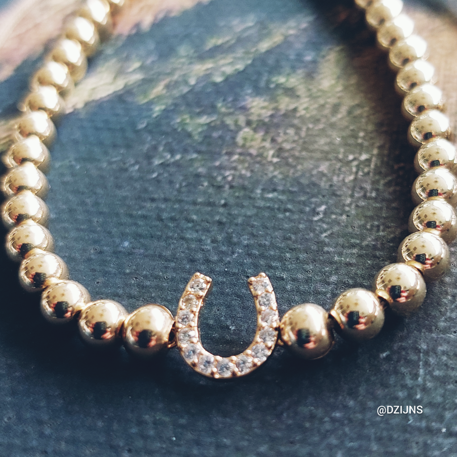 D-ZIJNS ARMBAND HOEFIJZER GOUD 4MM