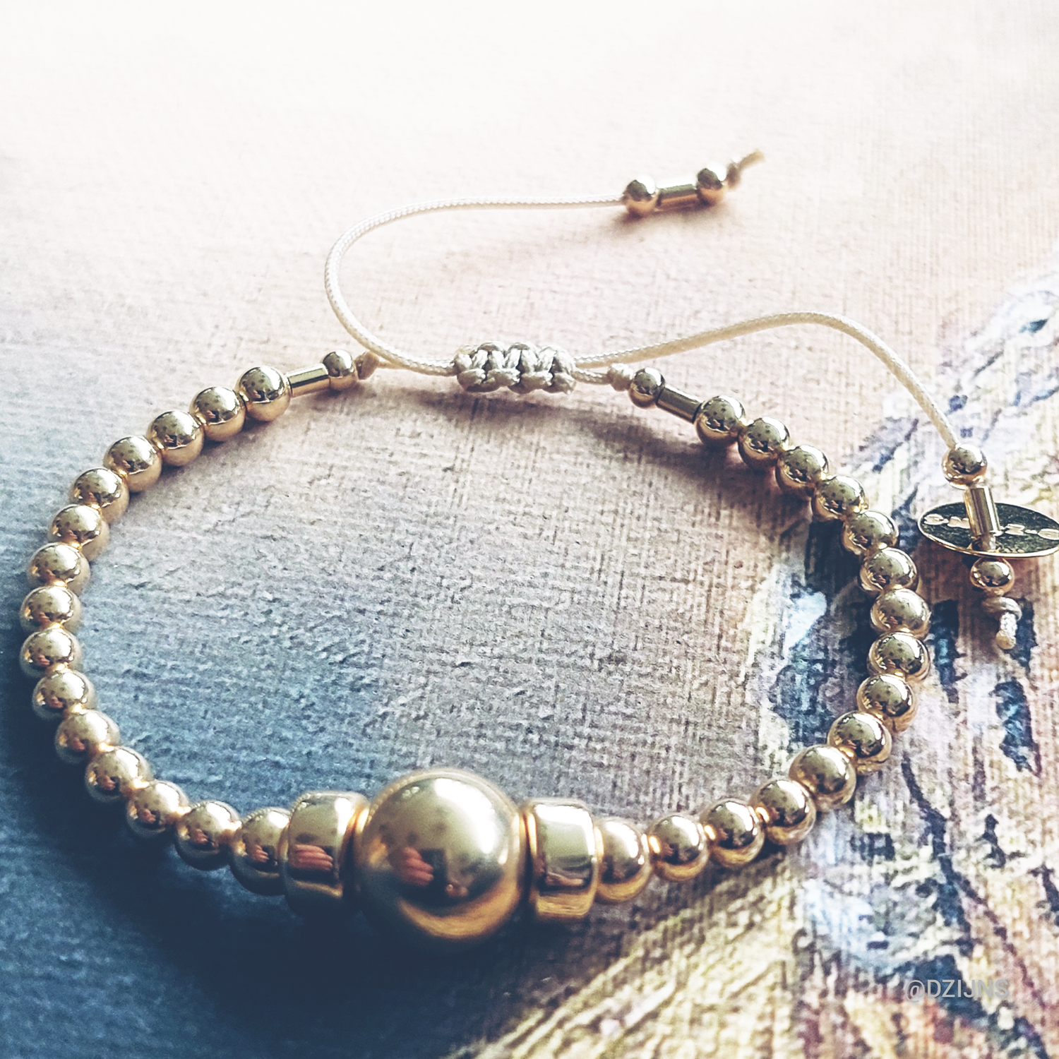 D-ZIJNS ARMBAND 14K STORM