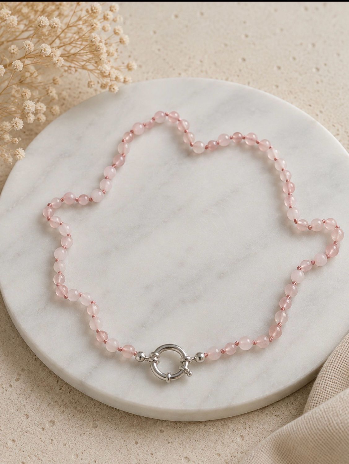 Rozekwarts collier met zilveren rondslot