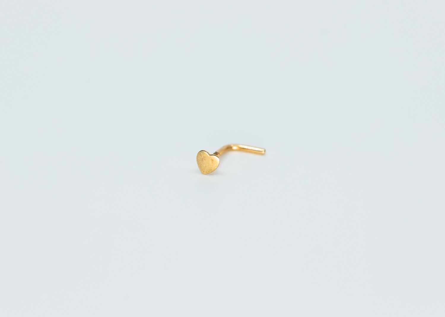 Solid 14kt gold nose piercing with an all gold heart mark 14k solid gold new