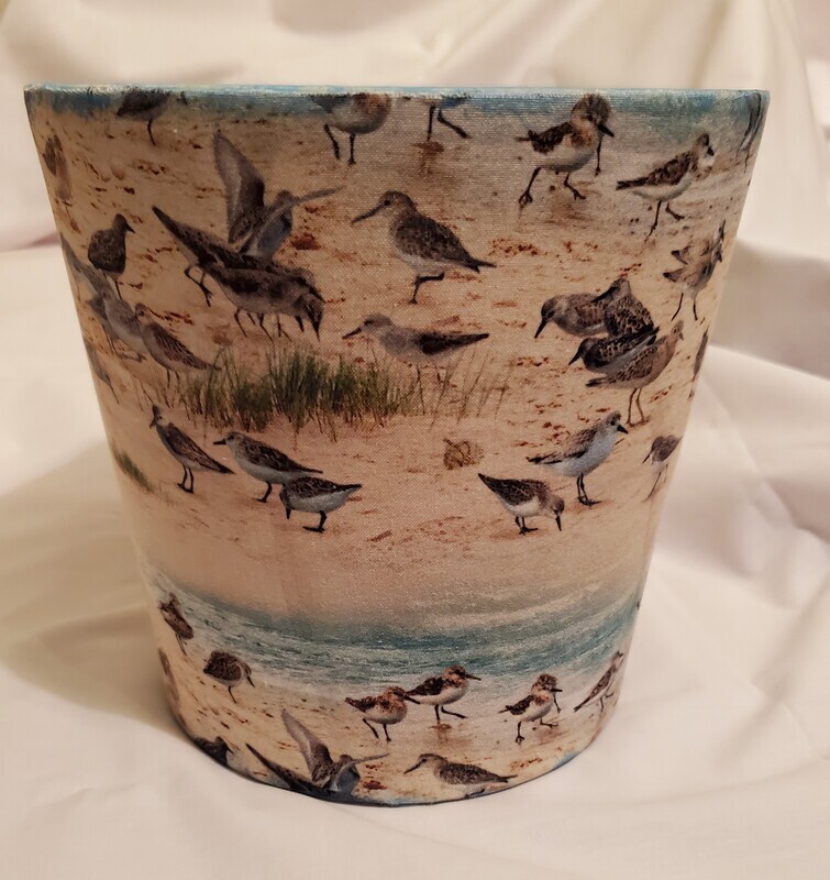 Flower pot- sandpiper on beach