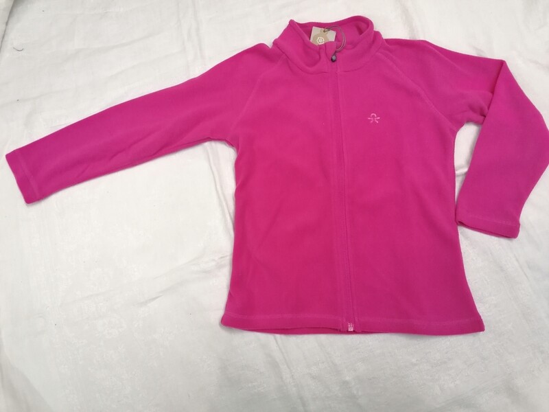 Jaquette en microfibres couleur rose vif, avec 2 poches à l'avant