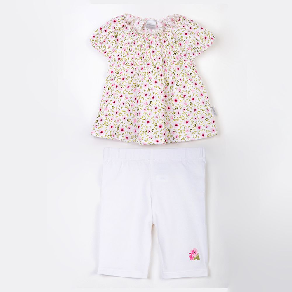 Ensemble d&#39;été fleuri en coton pour bébé avec blouse smockée et short corsaire blanc