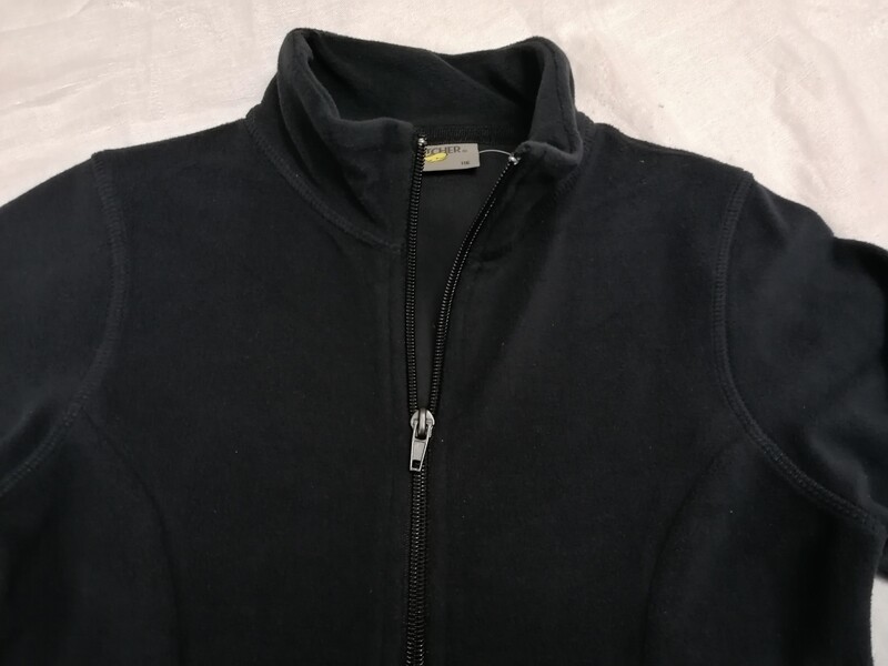 Jaquette en microfibre noir ébène, avec 2 poches à l'avant