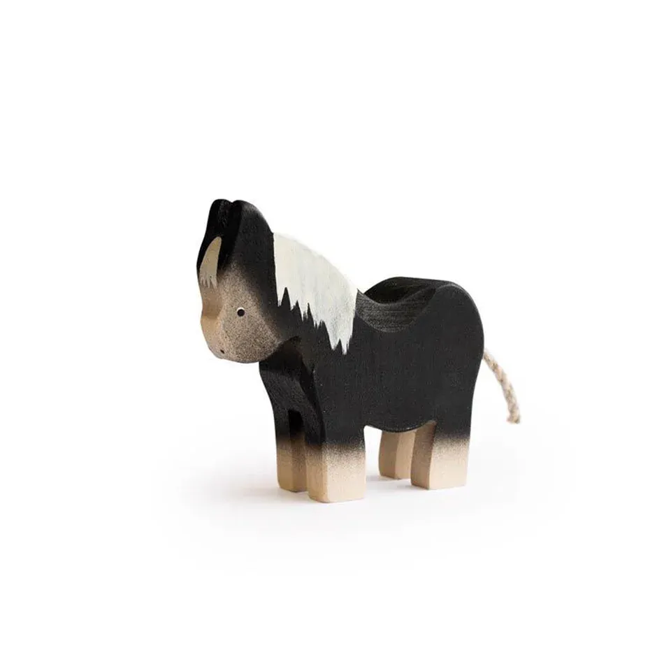 Trauffer Poney noir en bois no 1123, fabriqué en Suisse