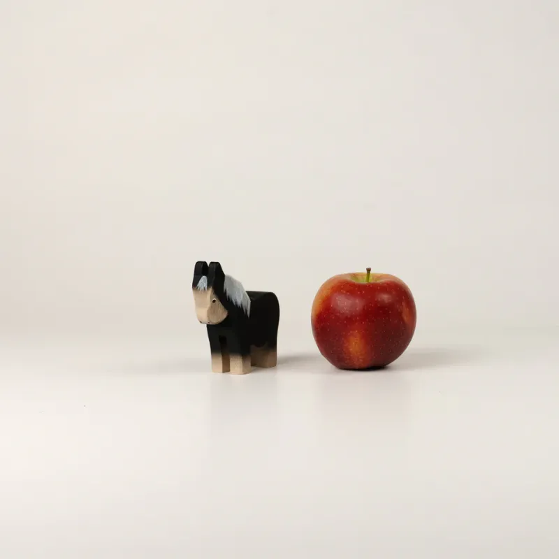 Trauffer Poney noir en bois no 1123, fabriqué en Suisse