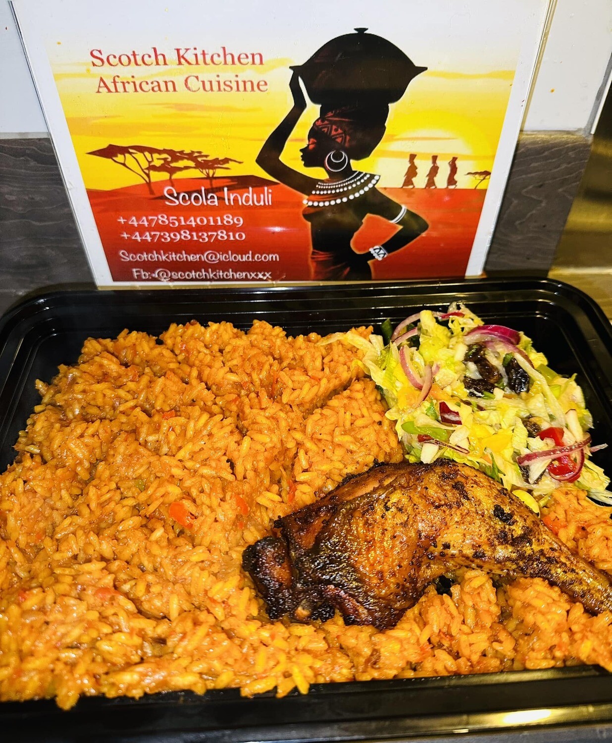 Jollof rice, Grilled chicken served with Tropical Salad, 465kcal