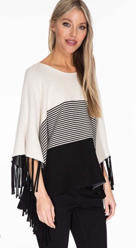 White fringed poncho sweater. Multiples