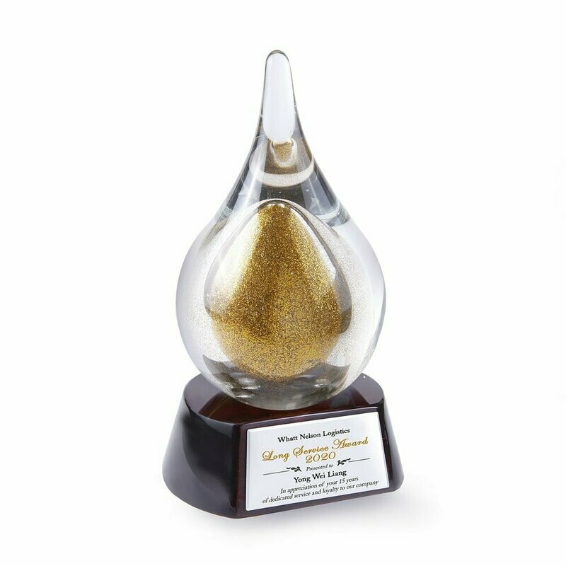 Golden Droplet on Piano Wood Base