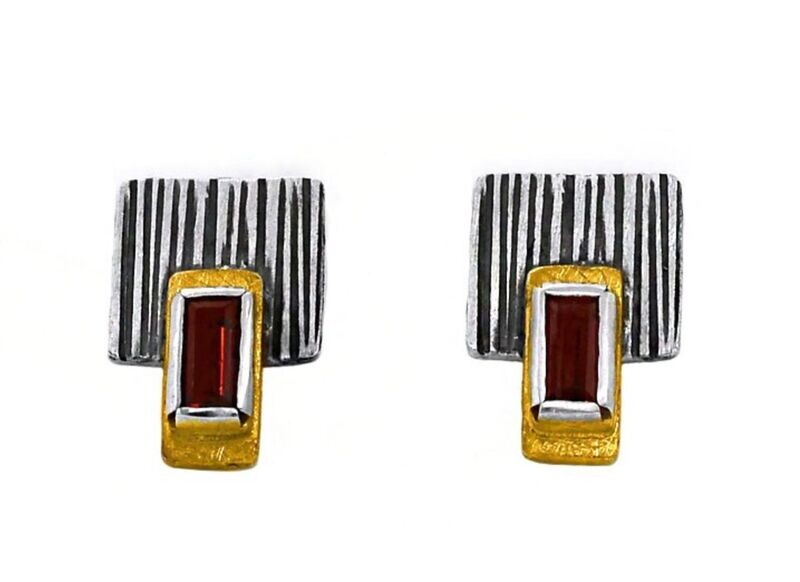 Stylish silver gold & garnet earrings.