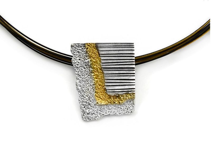 Geometric engraved pendant