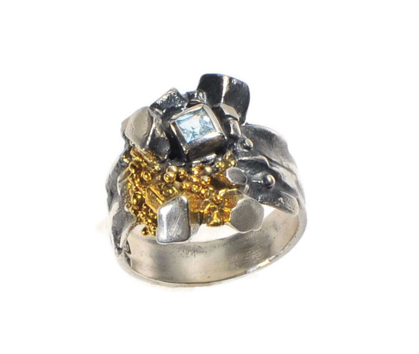 Contemporary ring with blue topaz