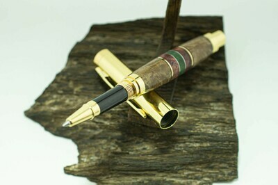 Stylish handmade maple rollerball with colored inserts.