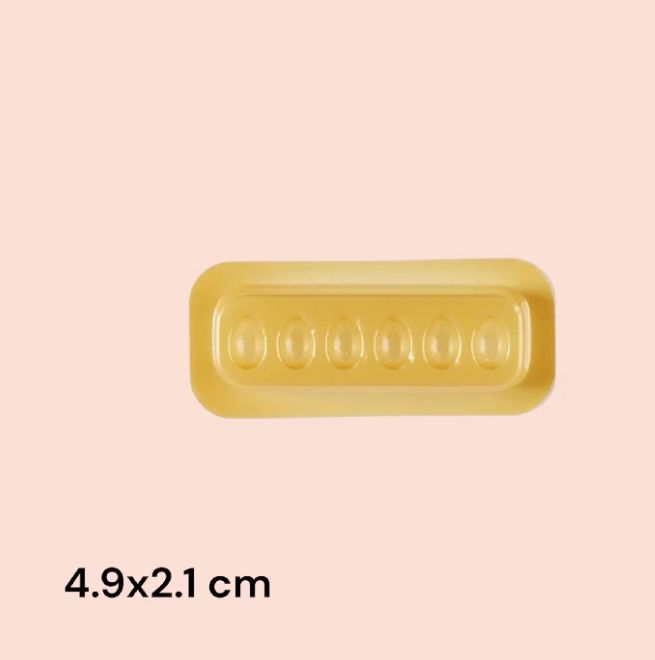 Gold-colored rectangular glue wells