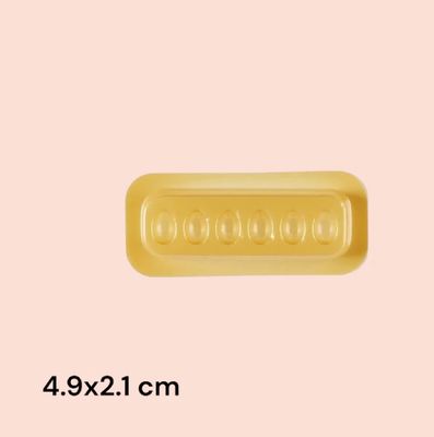 Gold-colored rectangular glue wells