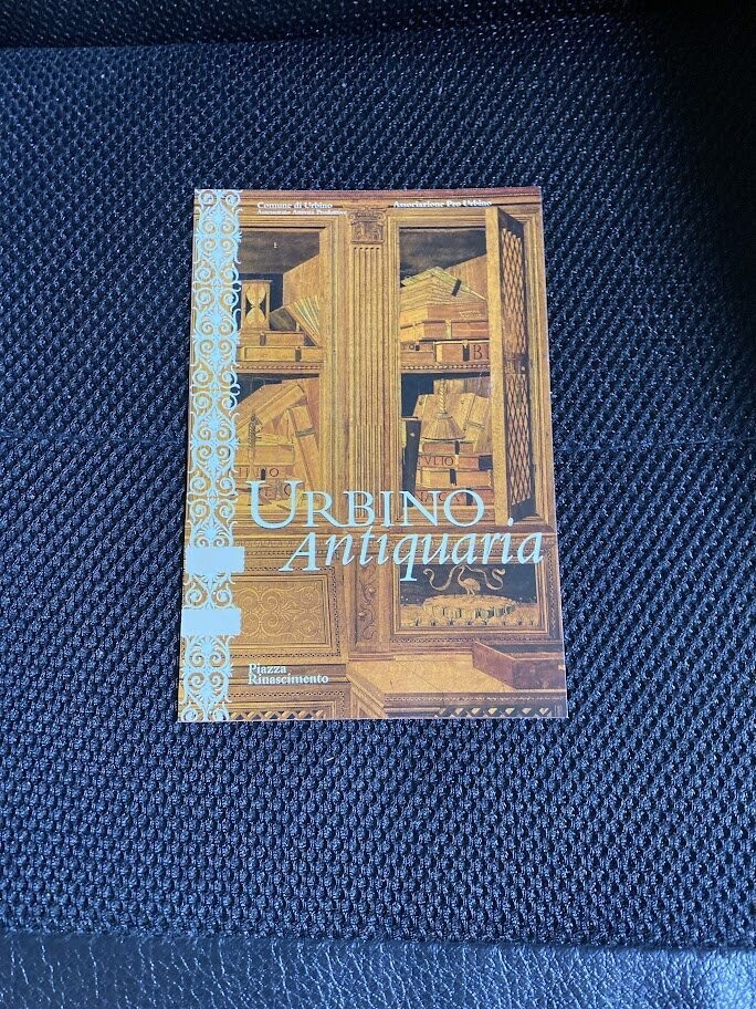 Cartolina Pubblicitaria Urbino antiquaria Non Viaggiata-colori