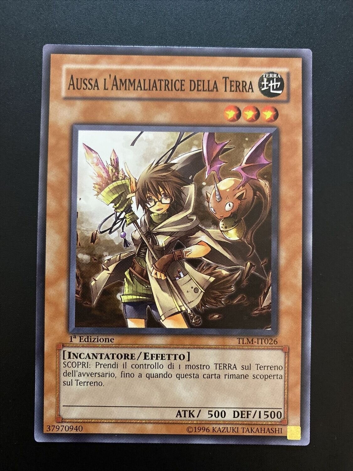 Carta YUGIOH-Aussa l'Ammaliatrice della Terra-TLM-IT026-ITA-Good-Common 1.Ed