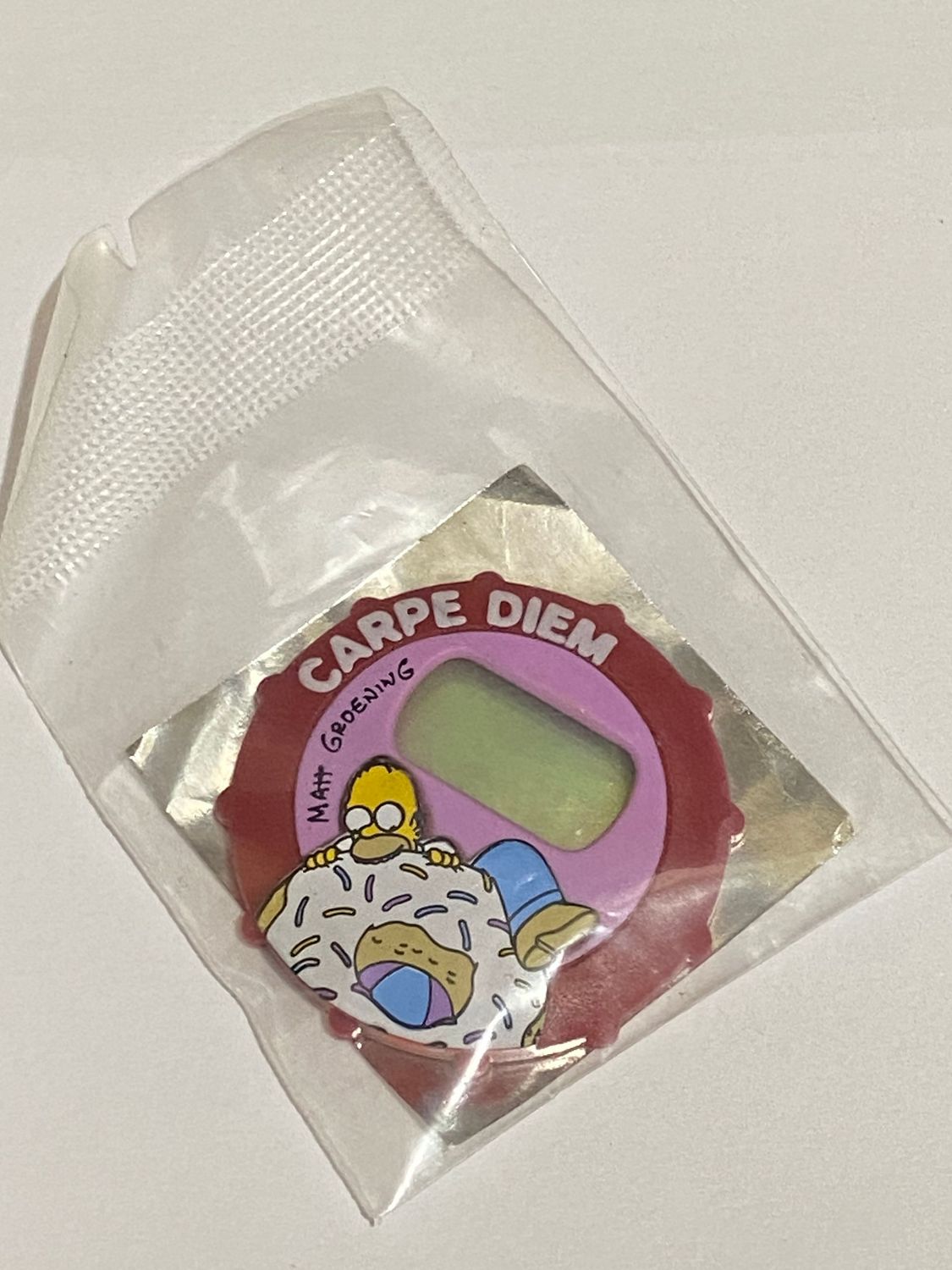 Sorpresa Kinder Brioss The Simpsons Homer Carpe diem - copri orologio
