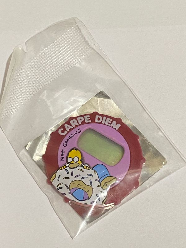 Sorpresa Kinder Brioss The Simpsons Homer Carpe diem - copri orologio