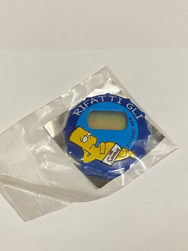 Sorpresa Kinder Brioss The Simpsons Bart rifatti gli occhi - copri orologio