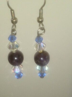 amethyyst round bead with swarovski crystals of blue and ab finish .