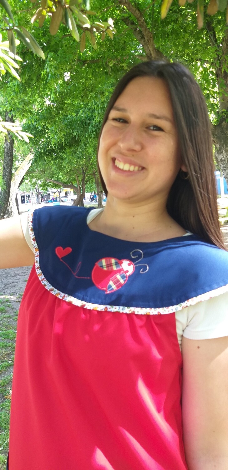 BABY ROJO con azul, con vaquita del logo.
