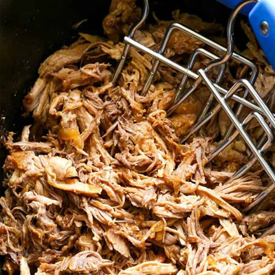Shredded and Sauced! (Fully Cooked, 7lb,  Ready to Eat Boston Butt Shredded and Sauced with our signature sauce so you don't have to.)