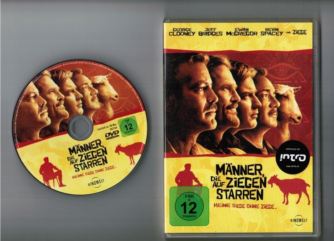 Männer die auf Ziegen starren