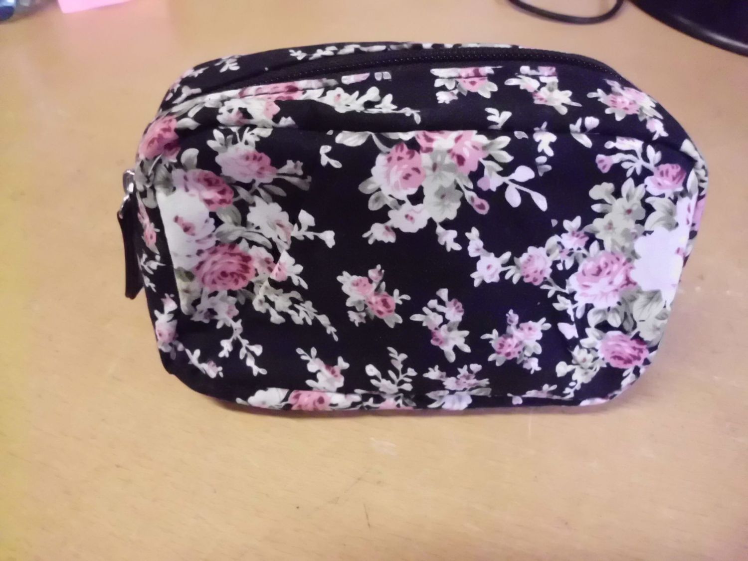Kosmetiktasche schwarz/geblümt