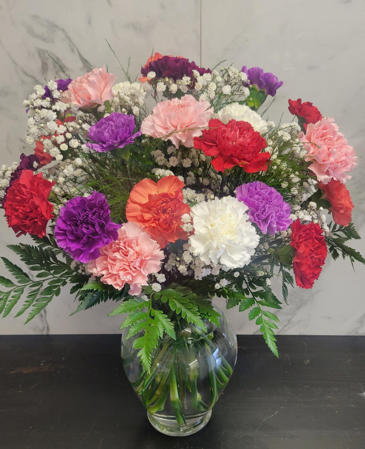 Two Dozen Carnations in a Vase