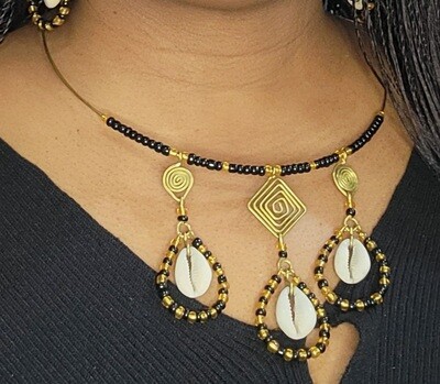 Brass Cowrie shell set Brass Cowrie shell set