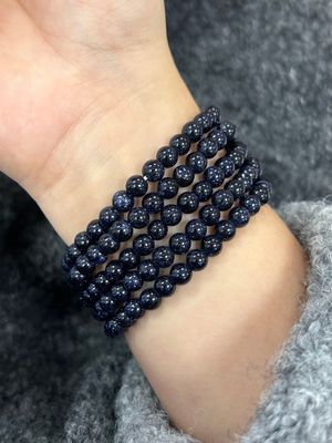 blauwe goudsteen armband 6mm (veel glitter)