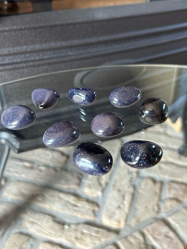Blauwe goudsteen trommelsteen (veel glitter)