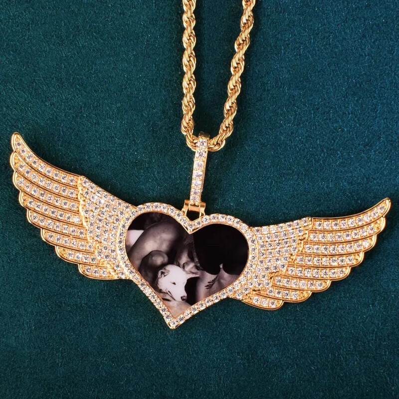 HEART SHAPED MEDALLION W/ WINGS