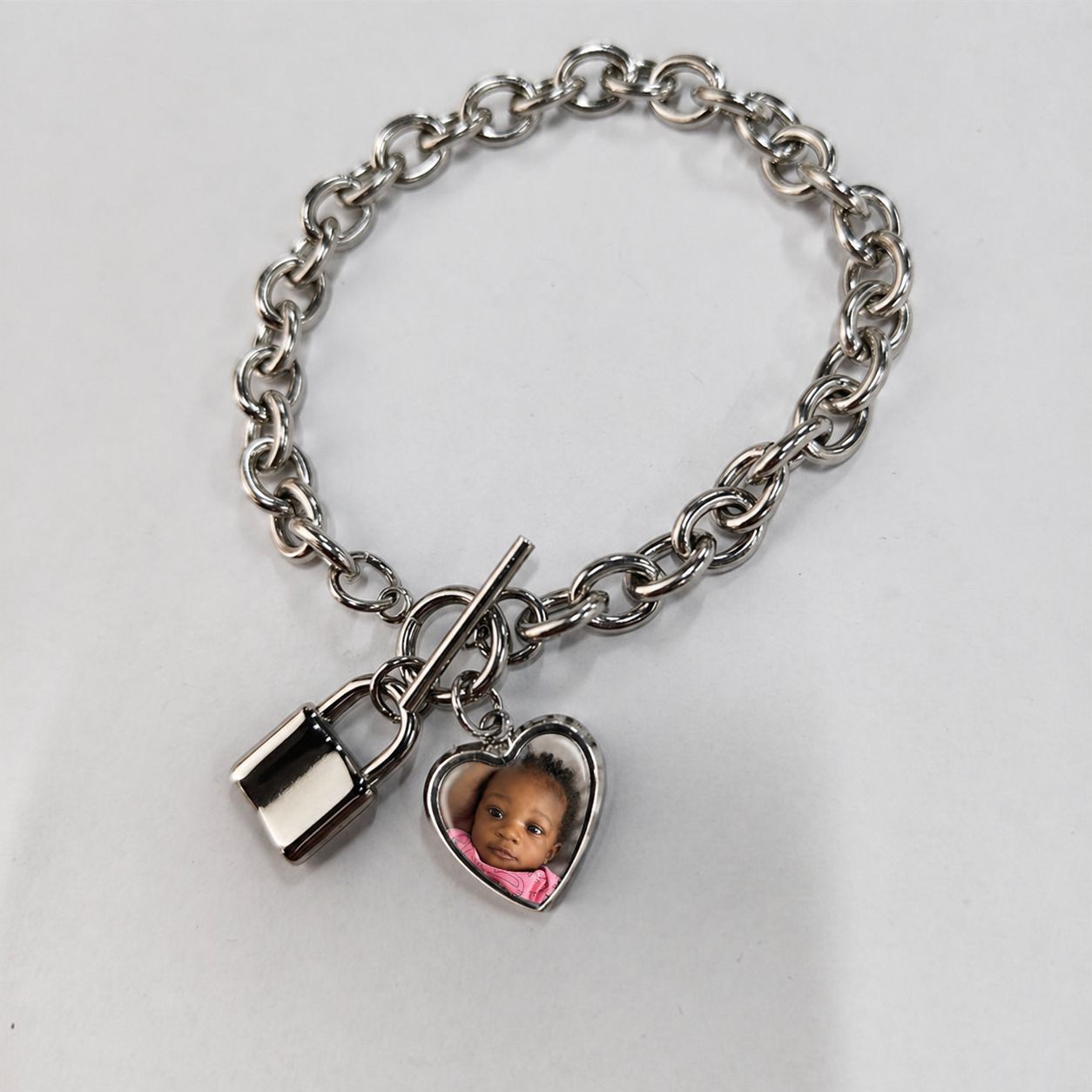‘LOCKED IN’ CHARM BRACELET