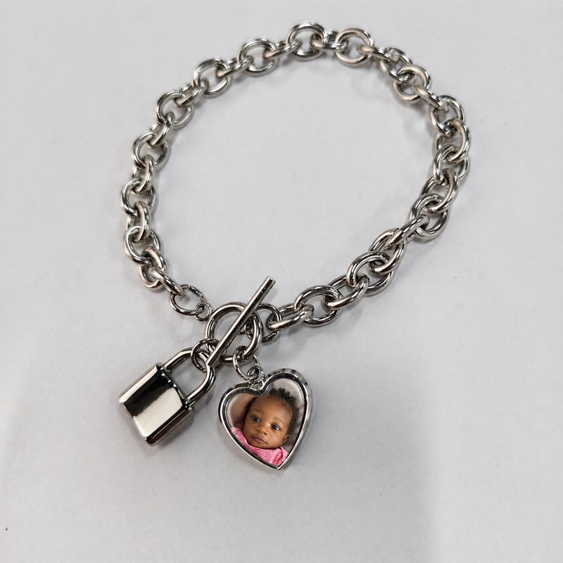 ‘LOCKED IN’ CHARM BRACELET