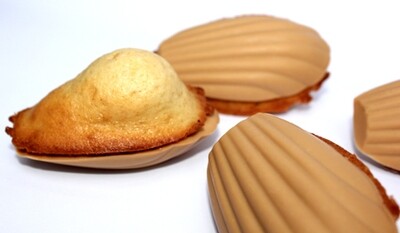 Madeleines with gold chocolate shell