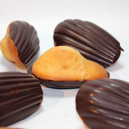 Madeleines with dark choc shell