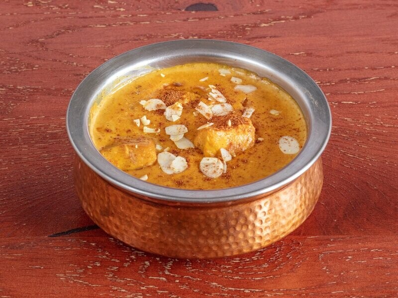 POULET SHAHI KORMA (Morceaux de poulet préparés aux noix de cajou et crème fraîche)